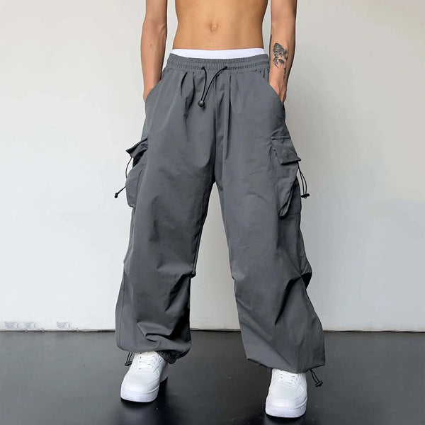 Mens Casual Sports Cargo Pants Woven Pocket Foot Rope Street Tie Solid Pants